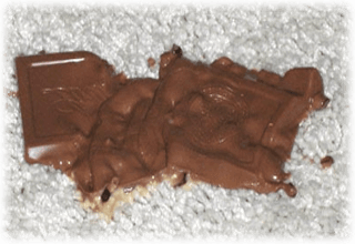 Mattvättning av chokladfläckar